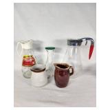 Glass and Ceramic Pitchers including Log Cabin Syrup Pitcher, Hull Pottery Creamer, and Stoneware Japan Creamer