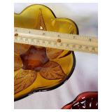 Amber, blue, and red decorative glass bowls