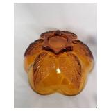 Amber, blue, and red decorative glass bowls