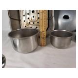 Lot of Kitchen Cookware and Accessories including Roasting Pan, Perforated Trays, Pots, and Lids