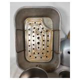 Lot of Kitchen Cookware and Accessories including Roasting Pan, Perforated Trays, Pots, and Lids
