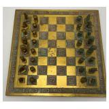 Est. $400.00- $600.00 14' x 14' Vintage Greek Brutalist Bronze Chess Set With Matching Brass Board