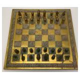Est. $400.00- $600.00 14' x 14' Vintage Greek Brutalist Bronze Chess Set With Matching Brass Board