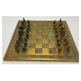 Est. $400.00- $600.00 14' x 14' Vintage Greek Brutalist Bronze Chess Set With Matching Brass Board