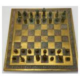 Est. $400.00- $600.00 14' x 14' Vintage Greek Brutalist Bronze Chess Set With Matching Brass Board