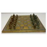 Est. $400.00- $600.00 14' x 14' Vintage Greek Brutalist Bronze Chess Set With Matching Brass Board