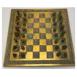 Est. $400.00- $600.00 14' x 14' Vintage Greek Brutalist Bronze Chess Set With Matching Brass Board