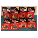 Eight 1:144 Scale Racing Champions Diecast Replicas