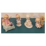Four Precious Moments Figurines