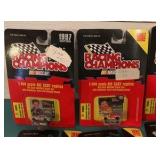 Eight 1:144 Scale Racing Champions Diecast Replicas