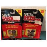 Eight 1:144 Scale Racing Champions Diecast Replicas