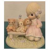Four Precious Moments Figurines