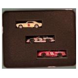 Two Tins Containing 3 Car Sets