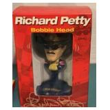 Richard Petty 1:64 scale Diecast Car and Bobbleheads