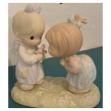Four Precious Moments Figurines and Plate