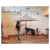 Patio umbrella with push button tilt.