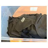 Tub of black cloth napkins