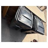 Pair of garbage cans on wheels