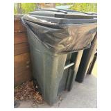 Pair of garbage cans on wheels