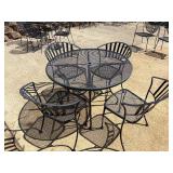 Round black mesh metal table and chairs