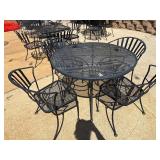Round black mesh metal table and chairs