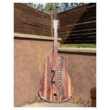 Large wooden guitar