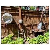 Contents of Fence - Antique Primitive items, Cast iron, Antique Hay Loaders etc