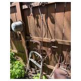 Contents of Fence - Antique Primitive items, Cast iron, Antique Hay Loaders etc