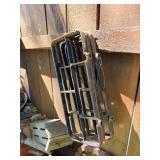 Contents of Fence - Antique Primitive items, Cast iron, Antique Hay Loaders etc