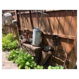 Contents of Fence - Antique Primitive items, Cast iron, Antique Hay Loaders etc