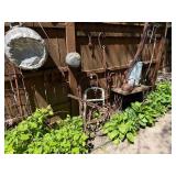 Contents of Fence - Antique Primitive items, Cast iron, Antique Hay Loaders etc