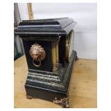 Ornate Black Marble-Style Mantel Clock With Key