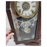Ornate Mechanical Wall Clock With Pendulum