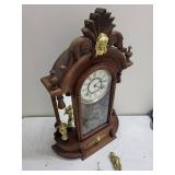 Ornate Wood Mantel Clock With Pendulum & Figural Accents