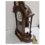 Ornate Wood Mantel Clock With Pendulum & Figural Accents