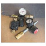 Air tool regulators and plumbing parts