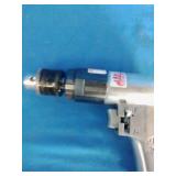 Mac Tools AD540 3/8' reversible air drill, featuring an aluminum housing and a keyed chuck
