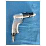 Mac Tools AD540 3/8' reversible air drill, featuring an aluminum housing and a keyed chuck
