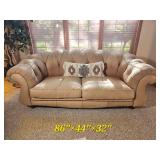 Cream Tufted Leather Sofa with Rolled Arms
