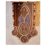Ornately Carved Wooden Wall Clock with Chain Weights