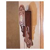 Ornately Carved Wooden Wall Clock with Chain Weights