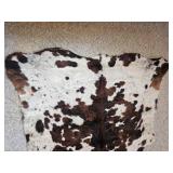Large Brown and White Cowhide Area Rug