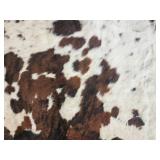 Large Brown and White Cowhide Area Rug