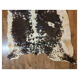 Brown and White Speckled Cowhide Rug