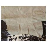 Brown and White Speckled Cowhide Rug