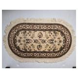 Oval Oriental Style Accent Rug with Fringe