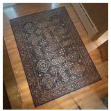H - Patterned Area Rug 63 X 90 in
