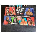 Collectible Jesse Ventura WWF action figures one with box and WWF Trivia Game