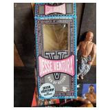 Collectible Jesse Ventura WWF action figures one with box and WWF Trivia Game