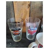 Lot of 9 Various styles of vintage coffee cups and glasses Budweiser, Schlitz and more